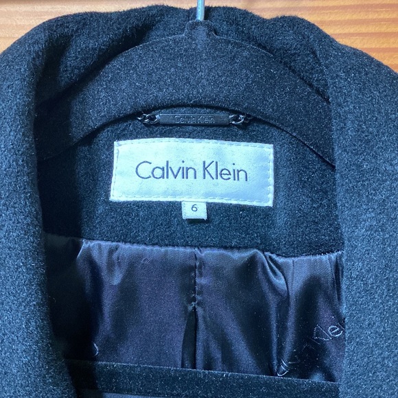 Calvin Klein black robe coat with a belt and two packets on the side used - Picture 2 of 16